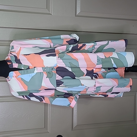 Gilli Dresses & Skirts - NWT GILLI Print half button up Henley neck ruffle baby doll dress size small